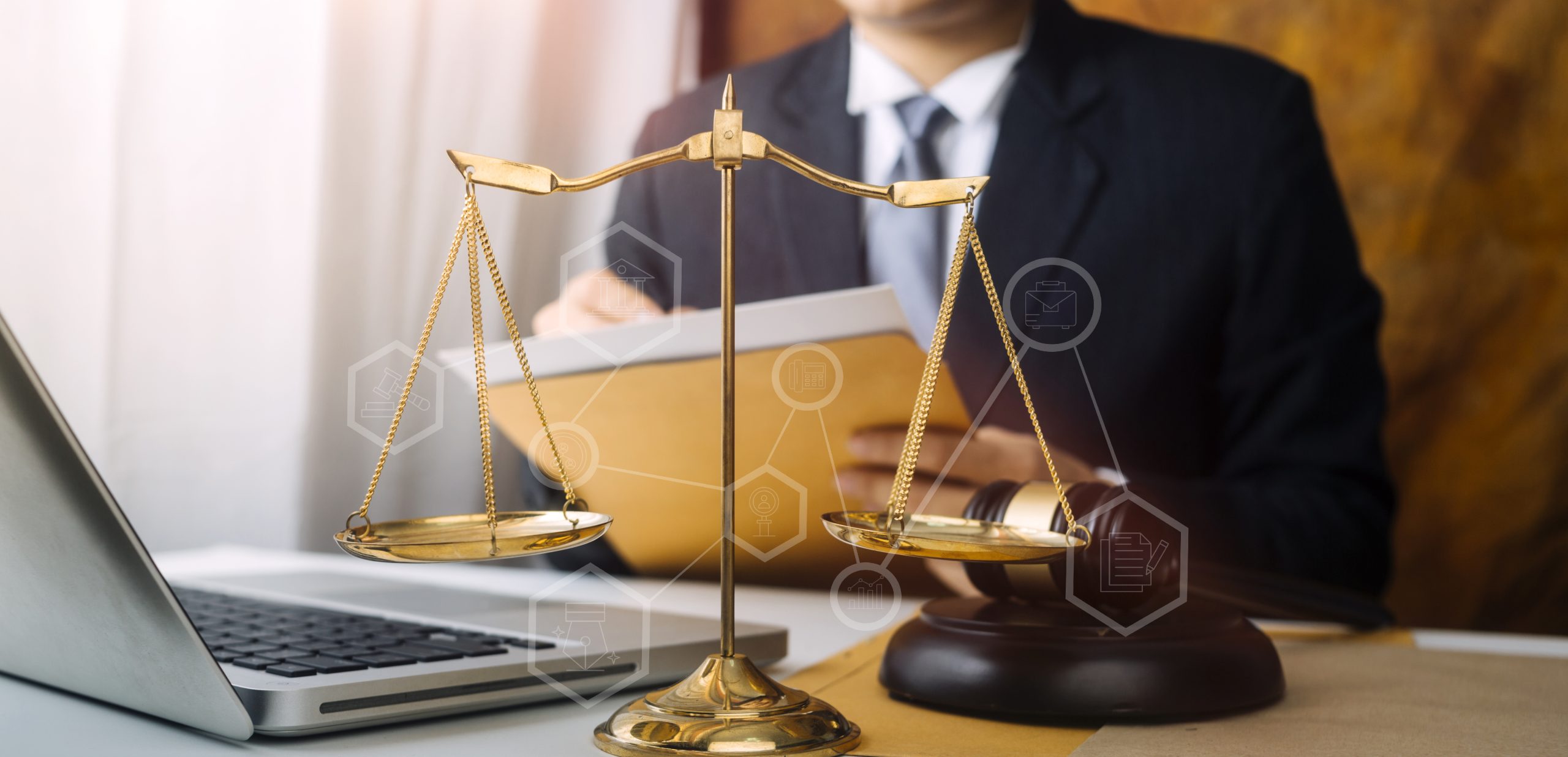 Business and lawyers discussing contract papers with brass scale on desk in office. Law, legal services, advice, justice and law concept picture with film grain effect
